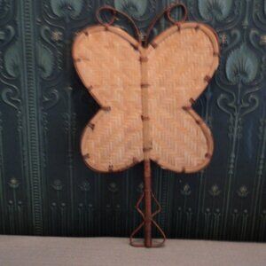 vintage wicker fan wall decor